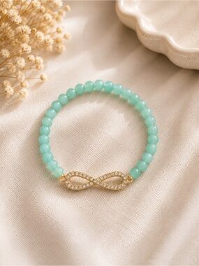 Gold Infinity Charm Mint Green Beaded Bracelet